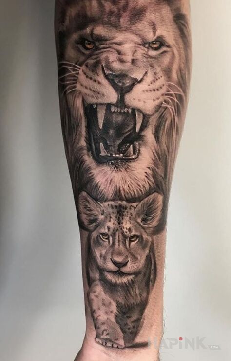 Tattoo Mały i duży lew in black and gray motif and realistic style on the forearm