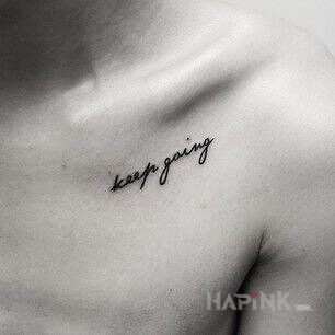 Tattoo Keep going in lettering motif and calligraphy style on the collarbone