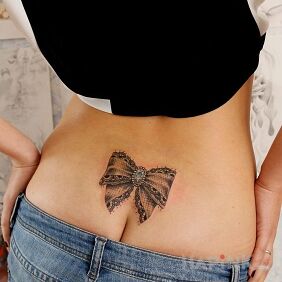 Tattoo Cocard on the back motif: objects style: realistic