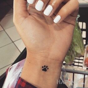 Tattoo Pawpaw on the wrist motif: other style: minimalistic