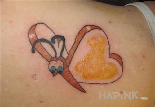 Tattoo Motylek in animals motif on the shoulder blades