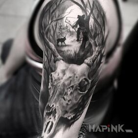 Tattoo Deer's head on the upper arm motif: animals