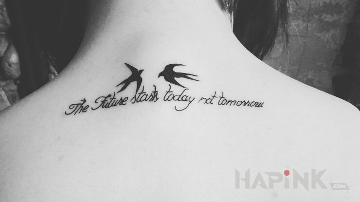 Tattoo The future starts today not tomorrow in lettering motif on the back