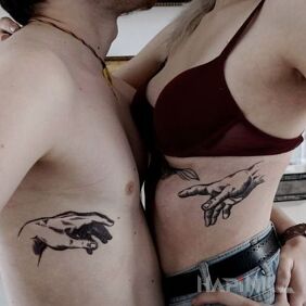 Tattoo Two hands on the ribs motif: Love style: graphic / illustrative