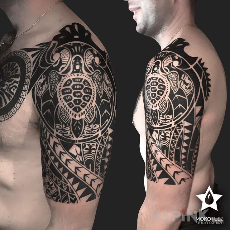 Tattoo Polinesian Tattoo in animals motif and Polynesian style on the upper arm