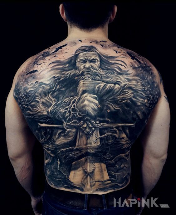Tattoo Wielki wojownik in faces motif and realistic style on the shoulder blades