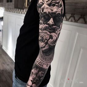 Tattoo Grandfather on the forearm motif: faces