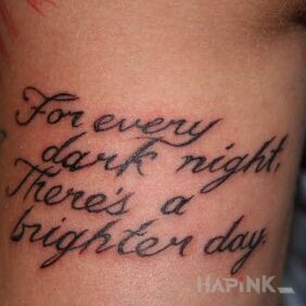 Tattoo Dark Nights, Bright Days on the upper arm motif: lettering