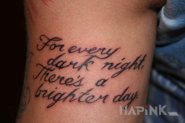 Tattoo Dark Nights, Bright Days in lettering motif on the upper arm