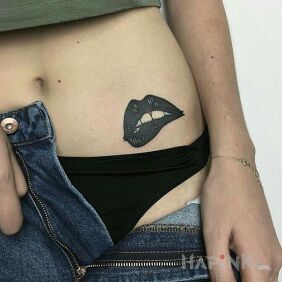 Tattoo Bitten lip on the stomach motif: other style: graphic / illustrative