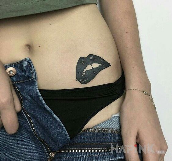 Tattoo Przegryziona warga in other motif and graphic / illustrative style on the stomach