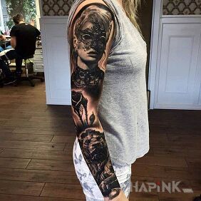 Tattoo The girl in the mask on the upper arm motif: animals style: realistic