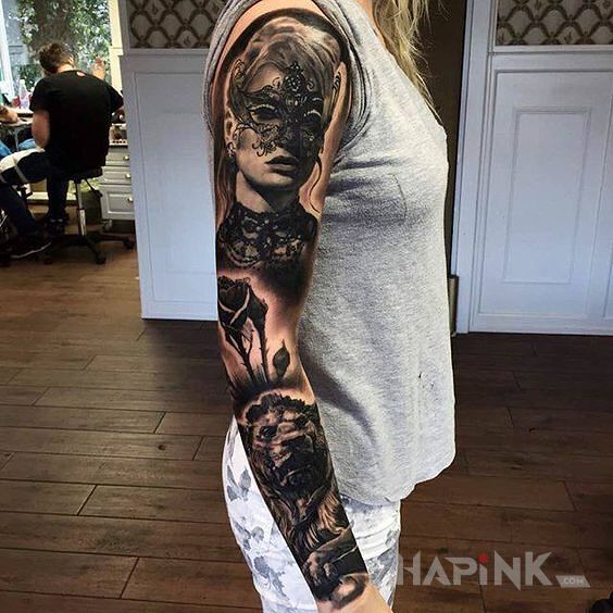 Tattoo Dziewczyna w masce in sleeves motif and realistic style on the upper arm