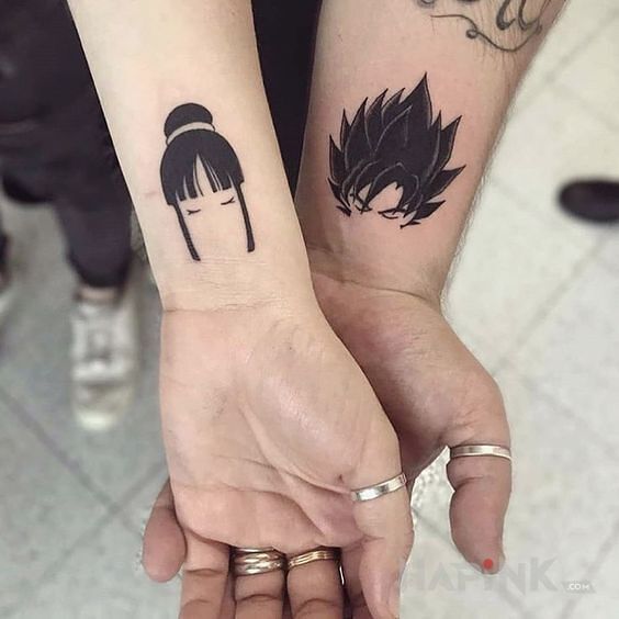 Tattoo Dragon Ball in Love motif and minimalistic style on the forearm