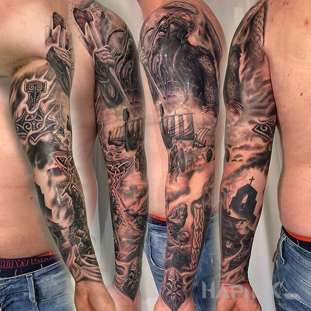 Tattoo Dzieło - wikingowie in black and gray motif and realistic style on the upper arm