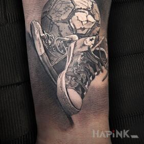 Tattoo Come on out to the field! on the forearm motif: black and gray style: realistic