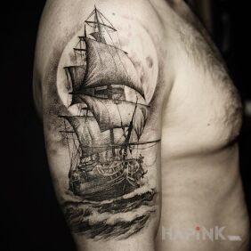 Tattoo Ship on the upper arm style: realistic