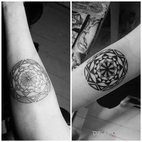 Tatuaż Mandala na przedramieniu motyw: czarno-szare styl: polinezyjskie