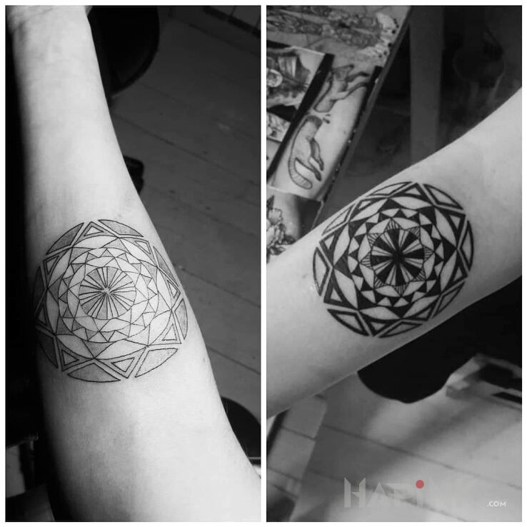 Tattoo Mandala in black and gray motif and Polynesian style on the forearm