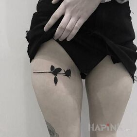 Tattoo Black rose on the leg motif: flowers style: blackwork / blackout