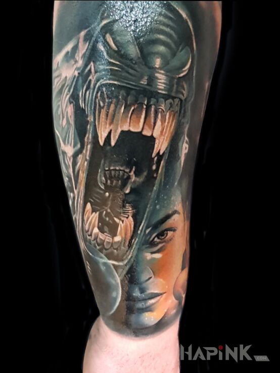 Tattoo Alien in 3D motif and realistic style on the forearm
