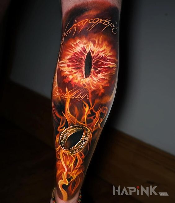 Tattoo Lord of the rings in colorful motif and realistic style on the calf