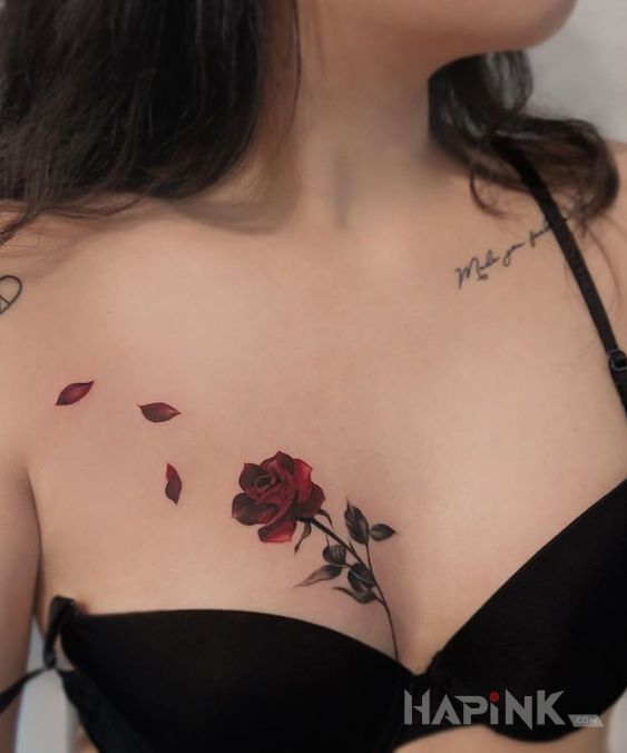 Tattoo Róża na piersi in flowers motif and realistic style on the breast
