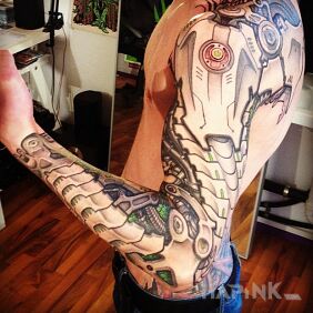 Tattoo Biomechanics on the upper arm motif: sleeves style: biomechanics