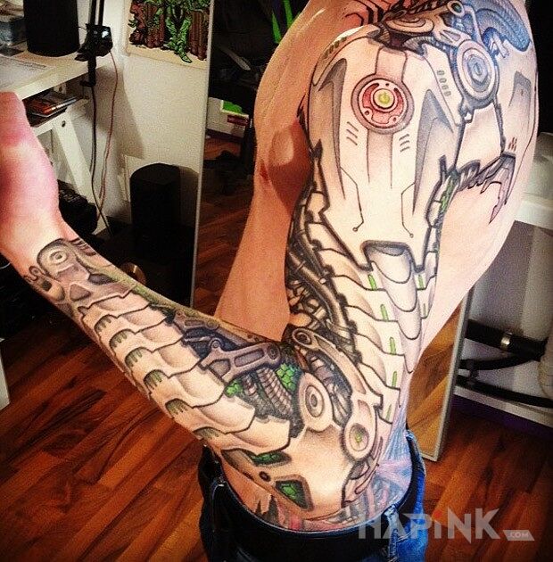 Tattoo Biomechanika in sleeves motif and biomechanics style on the upper arm