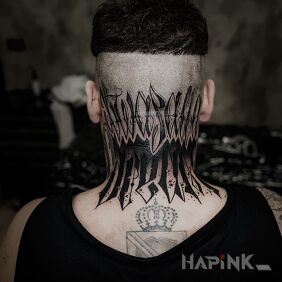 Tattoo Calligraphy on the head motif: lettering