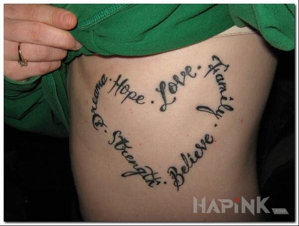 Tattoo Wazne wartosci in lettering motif on the ribs