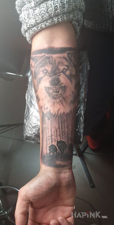 Tattoo Wilk in black and gray motif and realistic style on the forearm