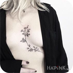 Tattoo Twig on the stomach motif: black and gray style: graphic / illustrative