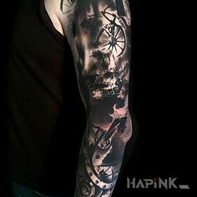 Tattoo Spotted trash polka on the upper arm motif: objects style: trash polka