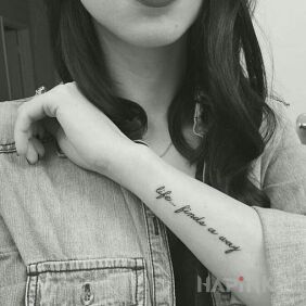 Tattoo Find your way on the forearm motif: lettering style: calligraphy