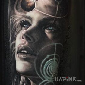 Tattoo Woman and space on the forearm motif: cosmos