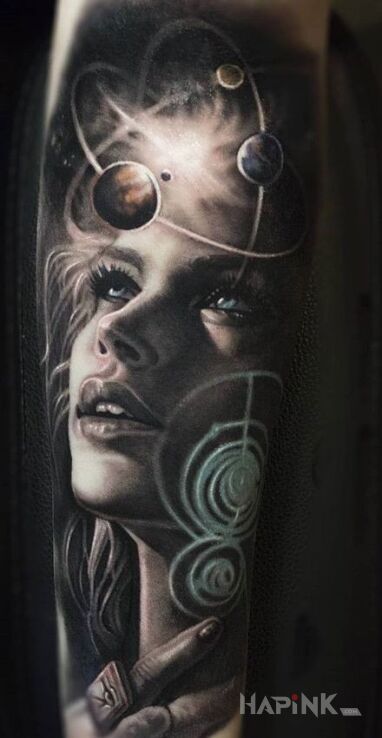 Tattoo Kobieta i kosmos in cosmos motif on the forearm