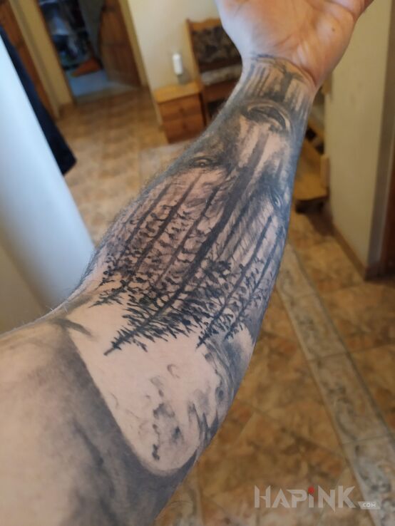 Tattoo Moja ręka :) in black and gray motif and realistic style on the forearm