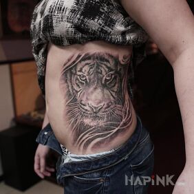 Tattoo Tiger on the ribs motif: animals