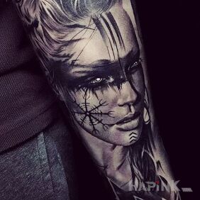 Tattoo Nordic woman on the forearm motif: black and gray style: realistic