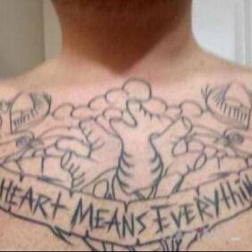Tattoo Heart Means Everything on the chest motif: lettering