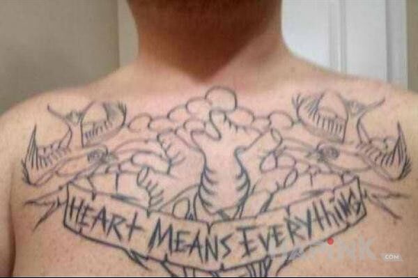 Tattoo Heart Means Everything in lettering motif on the chest