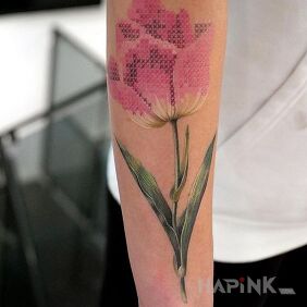 Tattoo Embroidered rose on the forearm motif: flowers style: embroidered