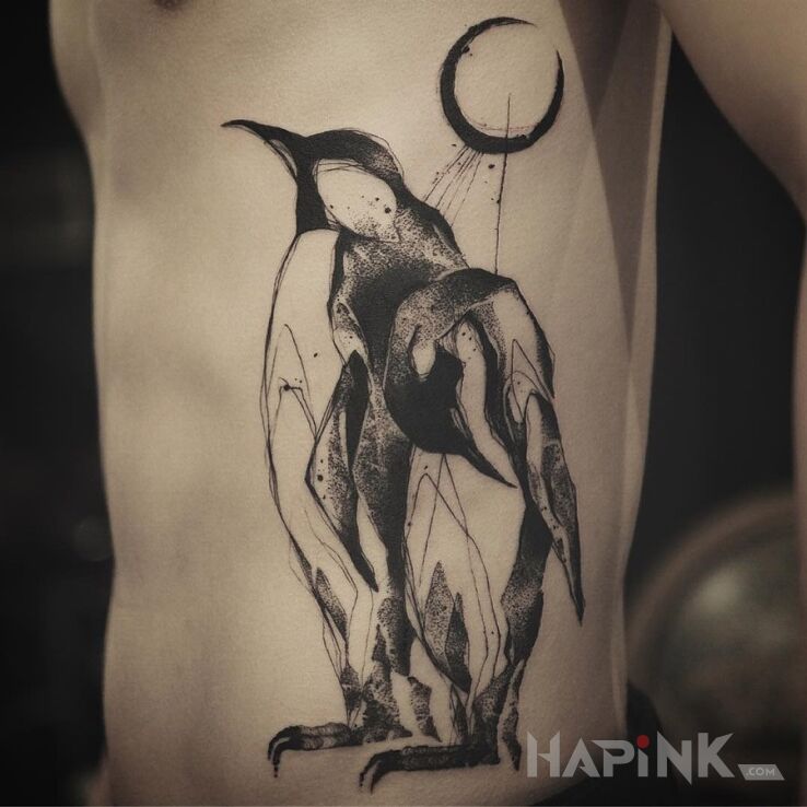 Tattoo Pingwiny in animals motif on the ribs