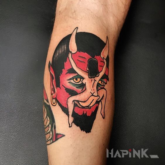 Tattoo Jezyczek diabla in demons motif and oldschool style on the leg