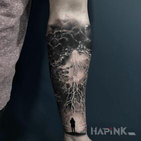 Tattoo Storm on the forearm motif: black and gray style: realistic