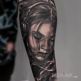 Tattoo Girl wearing headphones on the forearm motif: 3D style: realistic