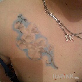 Tattoo Flower on the chest motif: flowers
