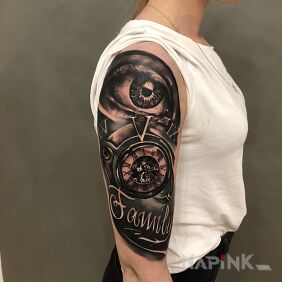 Tattoo Family on the upper arm motif: black and gray style: realistic
