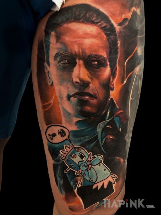 Tattoo Arnie in faces motif and realistic style on the leg